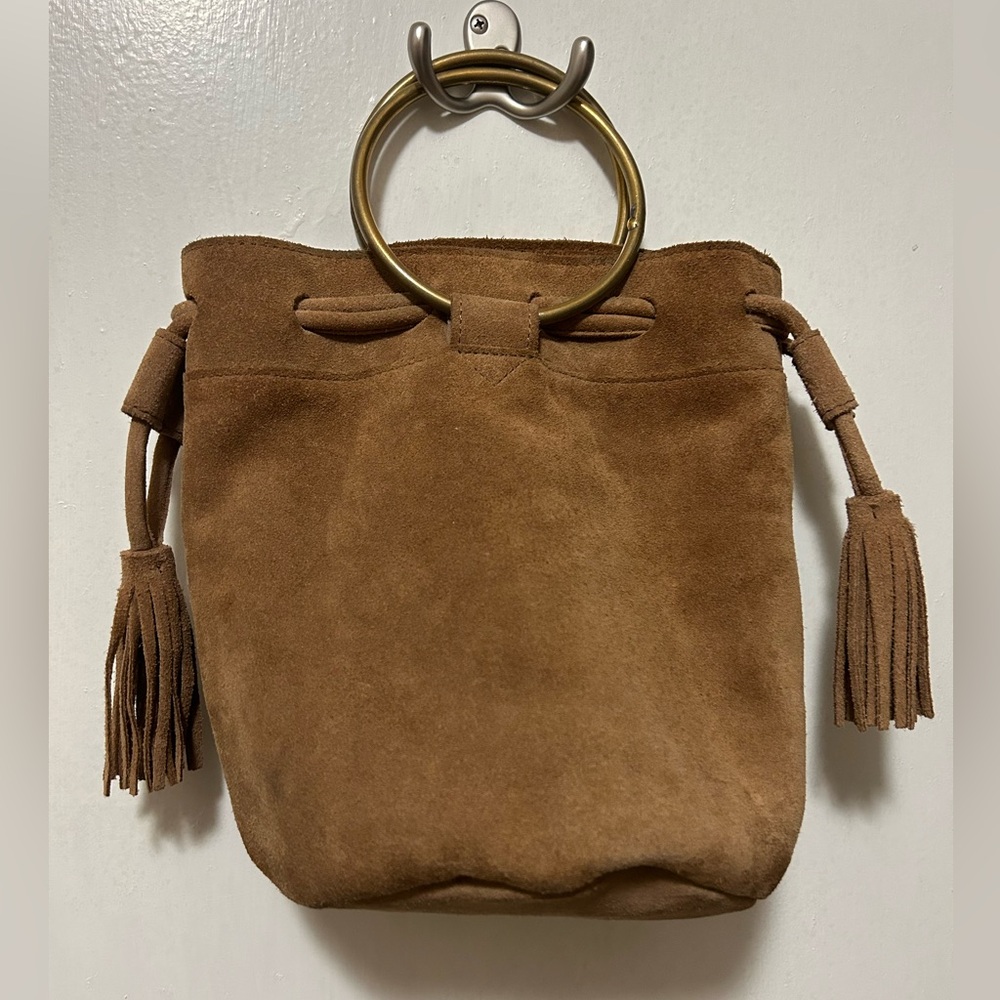 Suede tan boho bag with bangle handles.